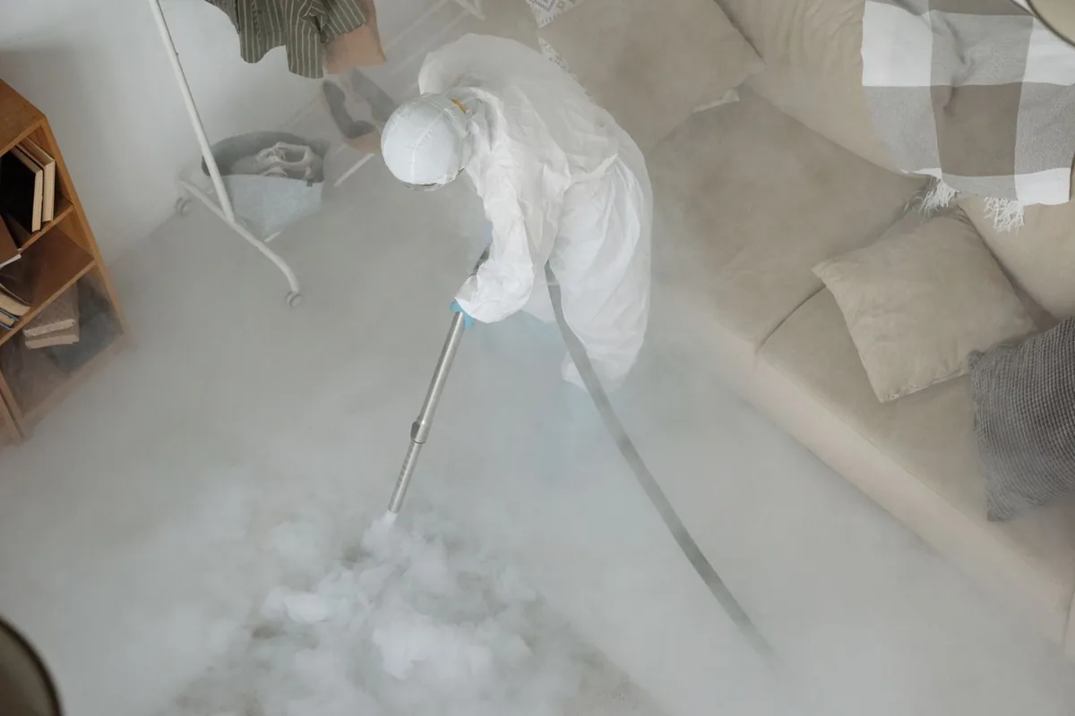 Biohazard cleanup technician in protective equipment, Baldwin, MI